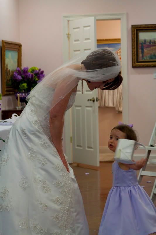 IMAGE: http://i102.photobucket.com/albums/m94/smooshdog/m%20and%20v%20wedding/mwedd45.jpg